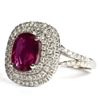 white gold and diamonds surrounding two carats unheated ruby