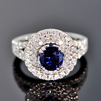 white gold and diamonds around a two carat unheated burma sapphire in royal blue