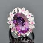 giant russian amethyst with diamonds and sapphires in cocktail ring
