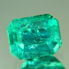 Sandawana oil-only emerald in emerald cut open blue-green