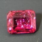 neon red rubellite, free of treatments, no window, no black-out even in low light