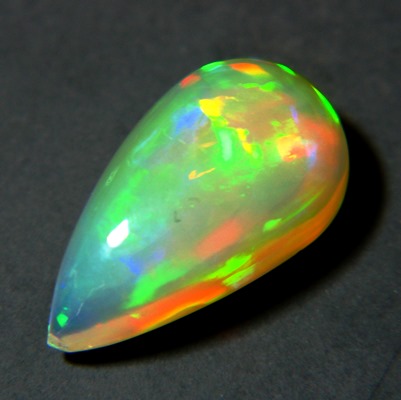 untreated all color neon welo opal in pear shape with broad flames