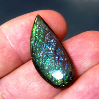 violet green blue purple croco surface ammolite untreated with IGI for a bespoke jewelry 