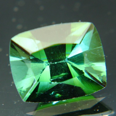 pine green tourmaline in artful antique cut of the 60ies