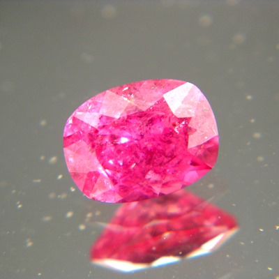 neon red rubellite, free of treatments, no window, no black-out even in low light