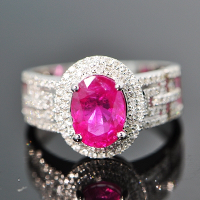 white gold and diamonds surrounding two and half carat unheated Mogok ruby