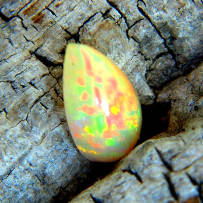 opal free of treatments with green, yellow, pink, red and orange colors