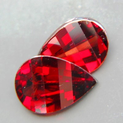 matching pear 3D checkerboard pair kernel shaped in orange red no-heat garnets for a pair of earring
