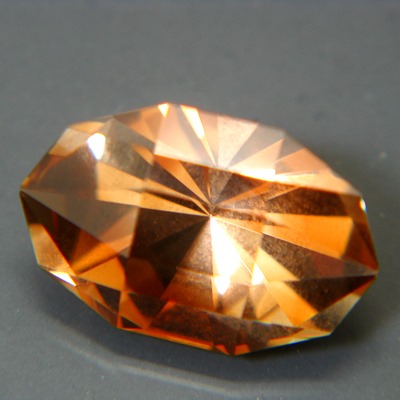 oval precision cut 3D orange untreated topaz unheated and natural