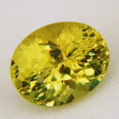 rare one color only lime green-yellow andalusite in natural untreated oval from brazil no pleochrois