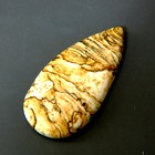 untreated white sandy colored jasper in pear shape over 20 carats