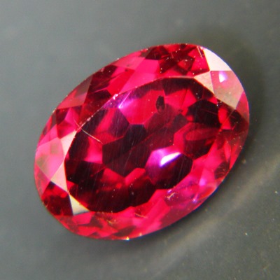 Ceylon garnet 1.66 carat, free of treatments, oval deep red with fiery glowing brilliancy