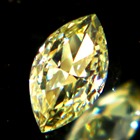 fancey yellow diamond in square cushion from Africa