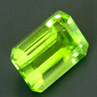 neon green pakistani peridot free of treatments, round and over 6 carat and 11mm