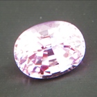 demin blue oval cut sapphire from Ceylon, unheated and natural, no window, IGI report