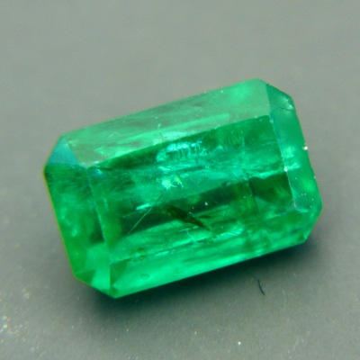 Sandawana oil-only emerald in emerald cut deep vivid green