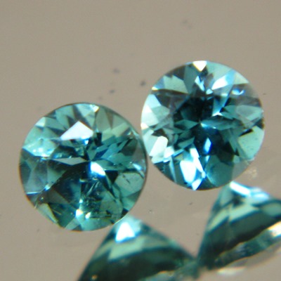 matching pair round brilliant tourmalines in green blue aka indicolites for a pair of studs in rare 