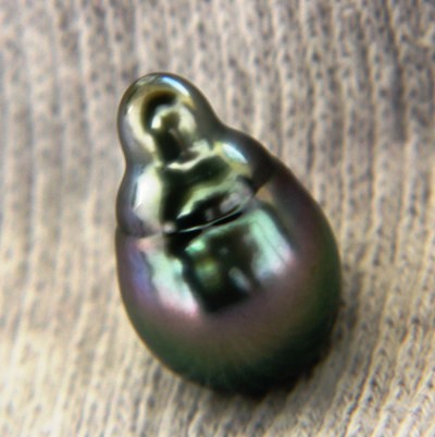 finest GIA certified untreated south sea saltwater black-lipped oyster pink on green baroque pearl