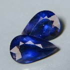 matching pair of certified untreated extra large iolites in dark blue