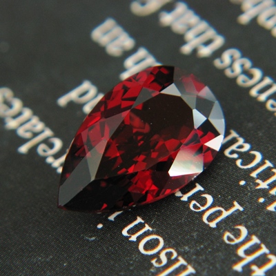 unheated deep orange pink-red pear rhodolite from africa over 5 carats