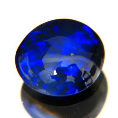 N1 black untreated welo opal in round cabochon from lightning ridge in finest blue