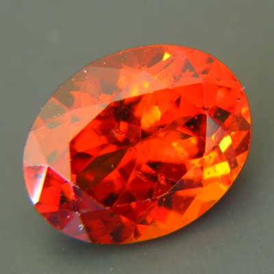 dark shiny red-orange hessonite from Sri Lanka with IGI report