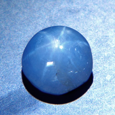 untreated natural blue star sapphire cabochon from Sri Lanka over one carat good star, weak color