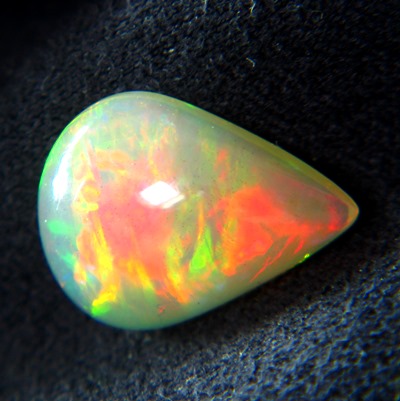 untreated all colors in neon welo opal pear shape with broad flames and pinpoint