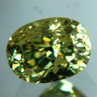 grass green demantoid in 5mm round diamond-killer