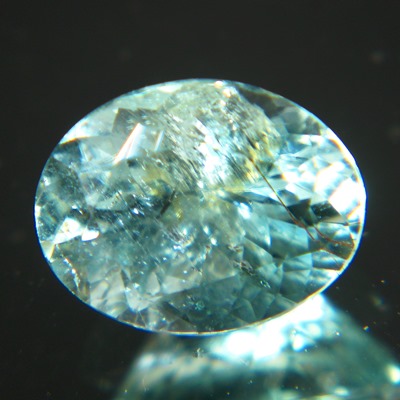 untreated cuprian paraiba tourmaline  with some inclusions or treatments trapezoid emerald cut in ov