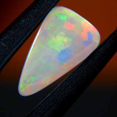 untreated white welo opal transparent with rainbow veils