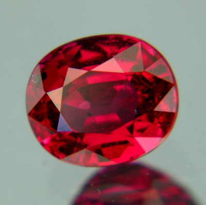 GRS certified unheated oval ruby in 1.55 carat with an orange tint (perhaps)