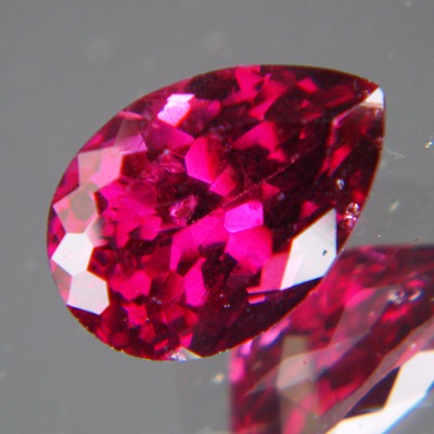 unheated deep red purple pear rhodolite from africa in precision cut