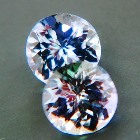 matching pair of certified unheated untreated multicolor tanzanite in round 