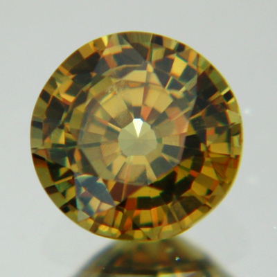 earthly colored round demantoid over one carat