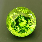 neon green pakistani peridot free of treatments, round and over 6 carat and 11mm