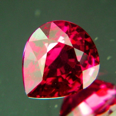 unheated deep orange pink-red pear rhodolite from africa over 5 carats