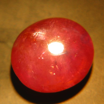 untreated natural padparadscha cabochon from Sri Lanka over seven carat