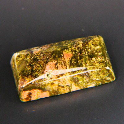 untreated green-orange-yellow gemstone called Unakite