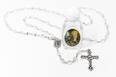 Rosary Beads & Bottle of Lourdes Water.