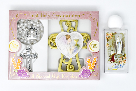 Girl's Communion Rosary and Lourdes Water.