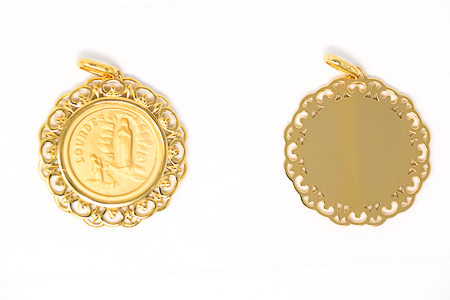 Gold Pendant depicting the Apparitions.