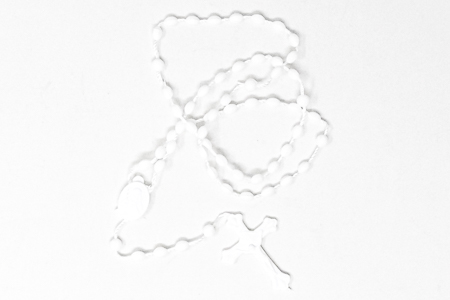 Plastic Corded White Rosary.